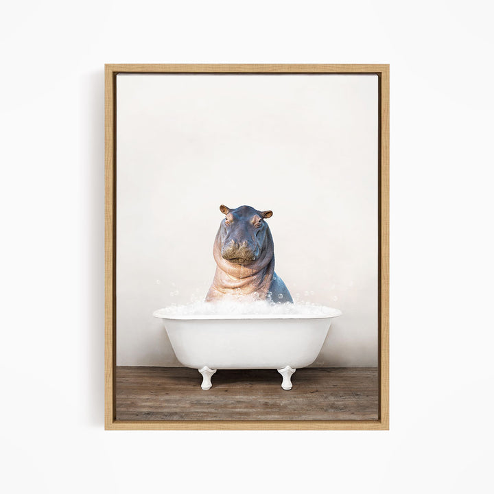 A hippopotamus sitting in a white bathtub filled with water, creating a whimsical and playful scene.