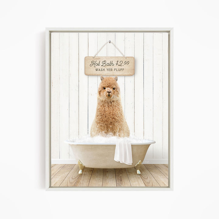 A fluffy brown dog sitting in a white bathtub filled with bubbles, with a wooden sign above the tub that reads "Hot Bath $2.00 WASH YER FLUFF".