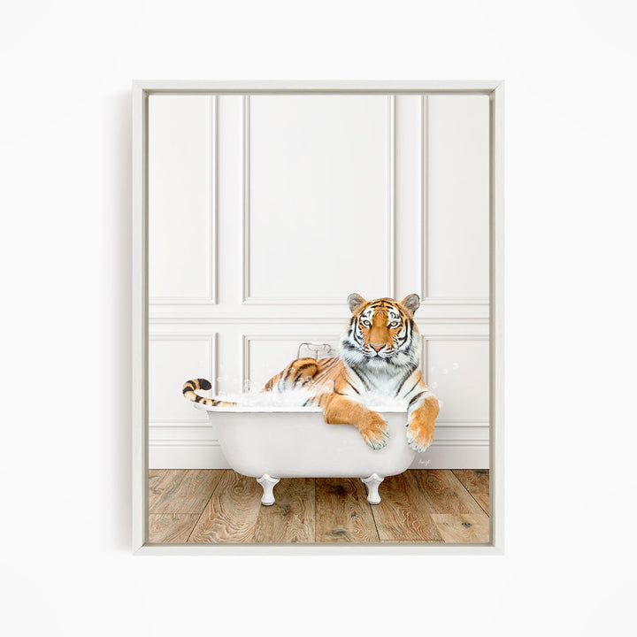 A tiger is sitting in a white bathtub, appearing relaxed and comfortable.