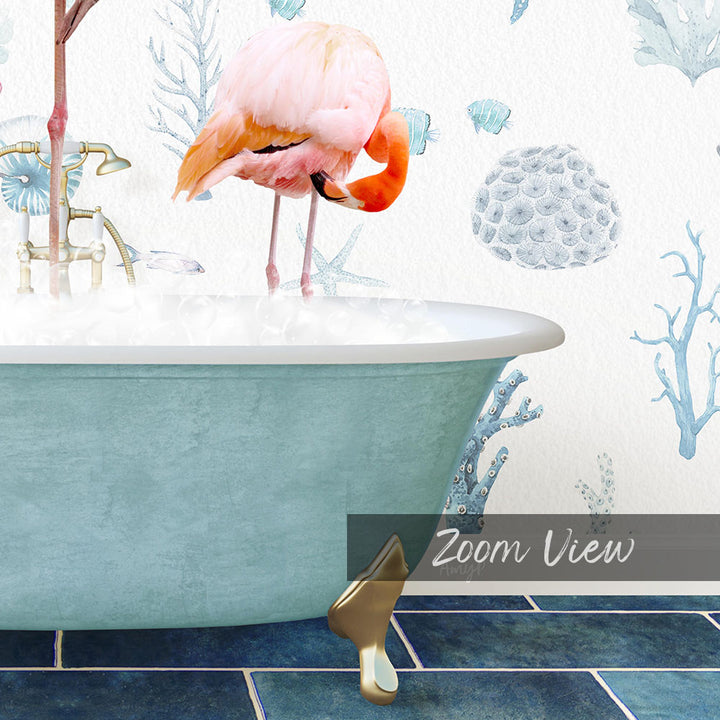 A pink flamingo standing in a bathtub filled with water, surrounded by a blue and white ocean-themed wallpaper.