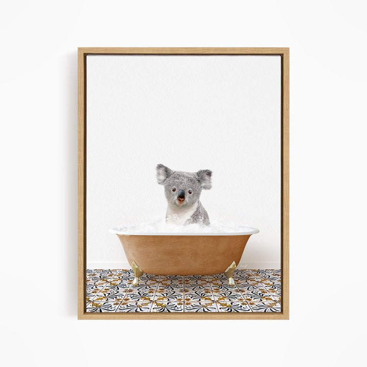 A koala bear sitting in a bathtub filled with water, surrounded by a patterned tile floor.