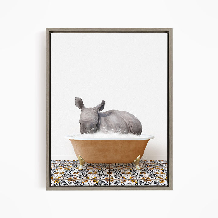 A rhinoceros is sitting in a bathtub filled with water, surrounded by a patterned tile floor.