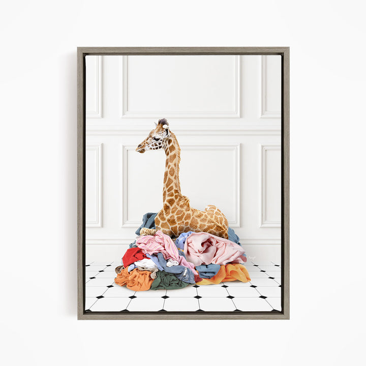 Baby Giraffe in Clothes Pile - Classic White Floor