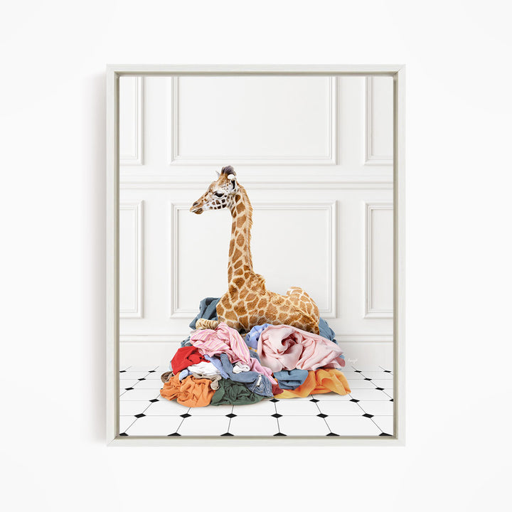 Baby Giraffe in Clothes Pile - Classic White Floor
