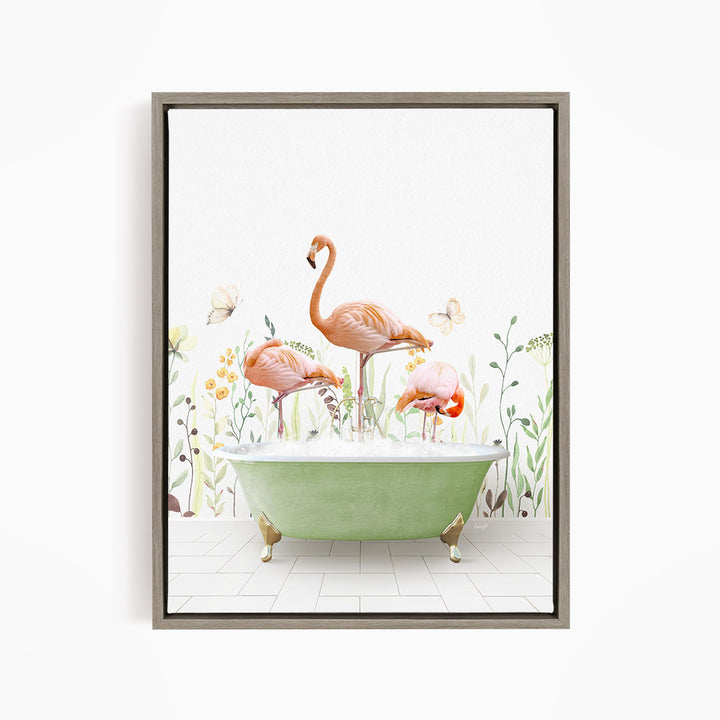 A framed image depicting three flamingos standing in a green bathtub filled with water, surrounded by flowers and butterflies.