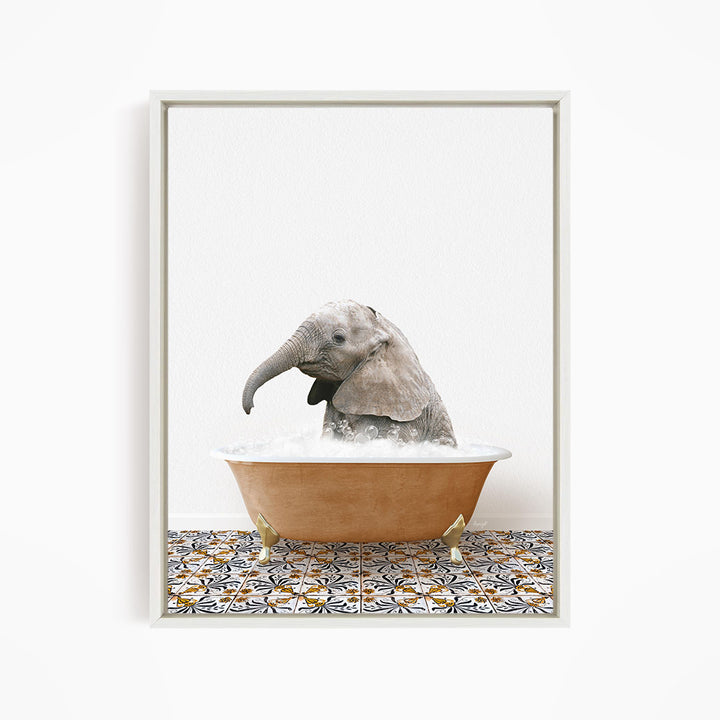 A baby elephant sitting in a bathtub filled with water, surrounded by a patterned tile floor.