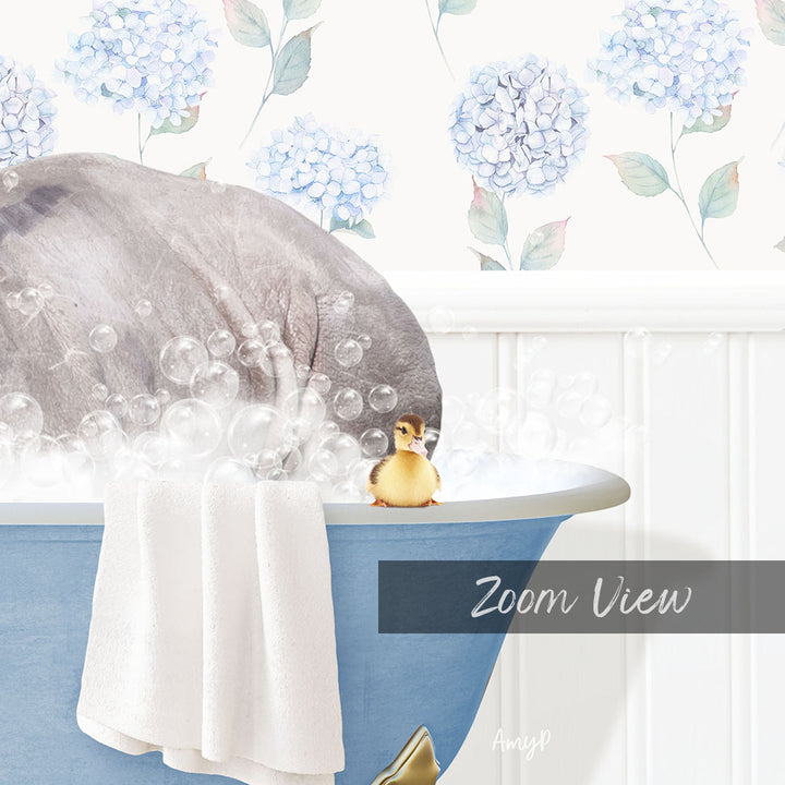 A gray elephant is sitting in a blue bathtub filled with bubbles, with a yellow duck sitting on the edge of the tub. The background features a floral pattern.