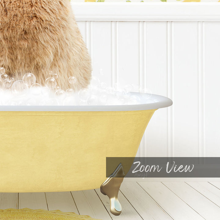 A fluffy brown cat sitting in a yellow bathtub filled with bubbles, with a white wooden wall in the background.