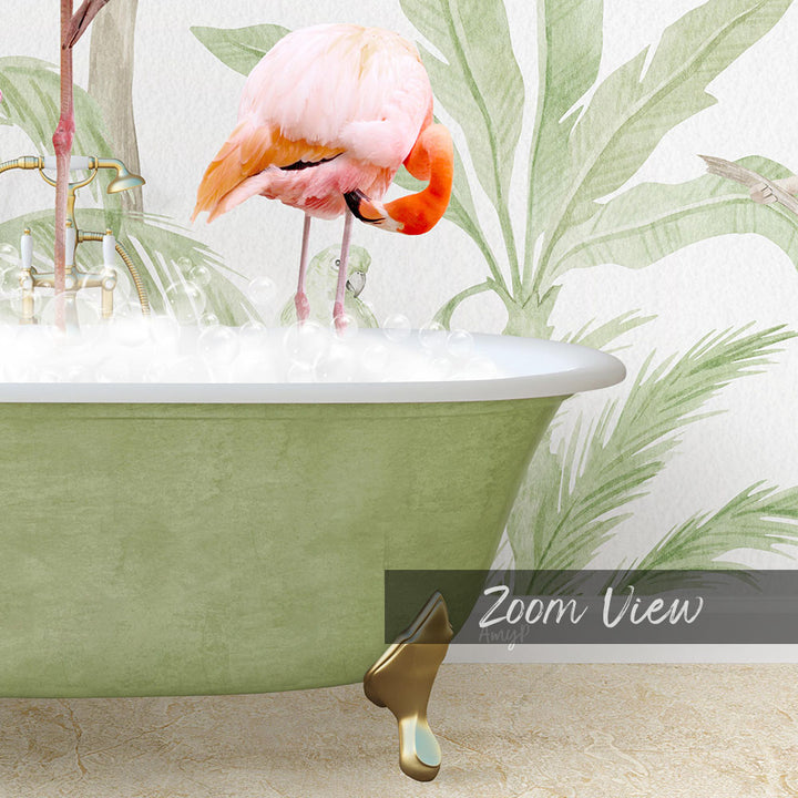 A pink flamingo standing in a green bathtub filled with water, surrounded by tropical plants.