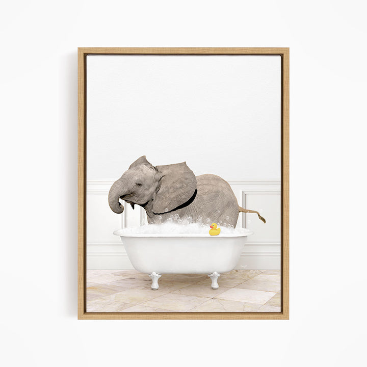 A gray elephant is standing in a white bathtub filled with water, with a yellow rubber duck floating on the water.