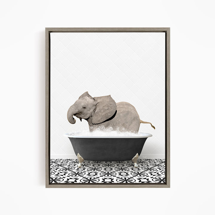 A gray elephant is sitting in a black bathtub filled with water, creating a whimsical and playful scene.