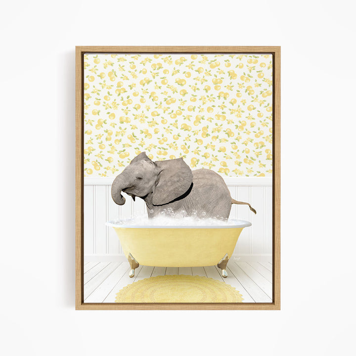 A gray elephant is sitting in a yellow bathtub filled with water, surrounded by a yellow floral wallpaper.