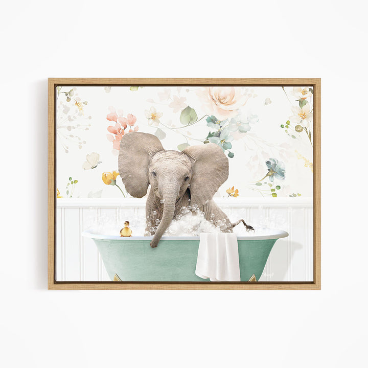 A gray elephant is sitting in a green bathtub filled with bubbles, surrounded by a floral pattern.