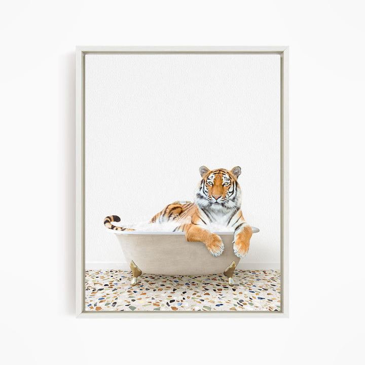 A tiger is sitting in a bathtub filled with water, appearing relaxed and comfortable.