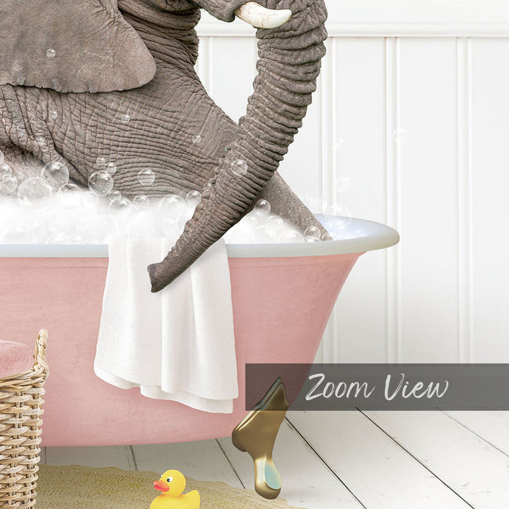 A large gray elephant is sitting in a pink bathtub filled with bubbles, surrounded by a yellow rubber duck and a basket.