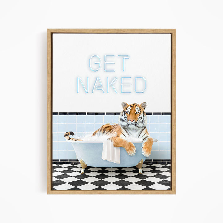 A tiger sitting in a bathtub with the text "GET NAKED" displayed above it.