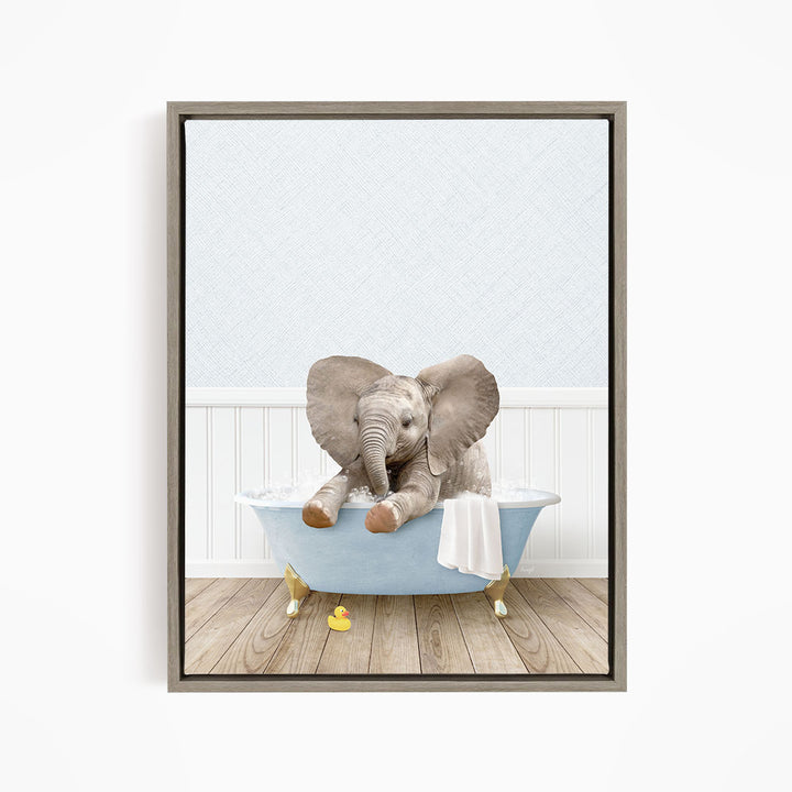 A baby elephant sitting in a blue bathtub, surrounded by rubber ducks.