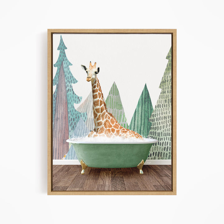 A giraffe is sitting in a green bathtub, surrounded by trees and mountains in the background.