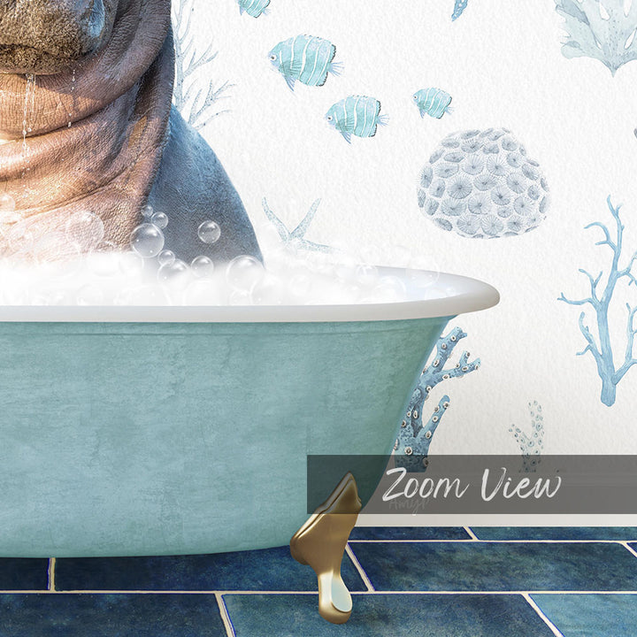 A bathtub filled with bubbles, with a gold bathtub faucet and a wall decorated with blue and white fish and coral designs.