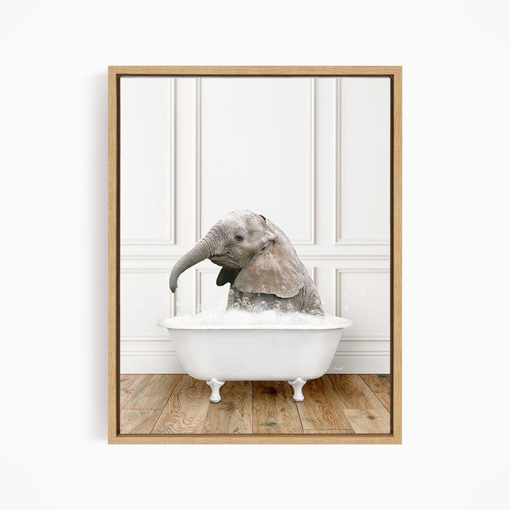 A baby elephant sitting in a white bathtub filled with water, creating a playful and whimsical scene.