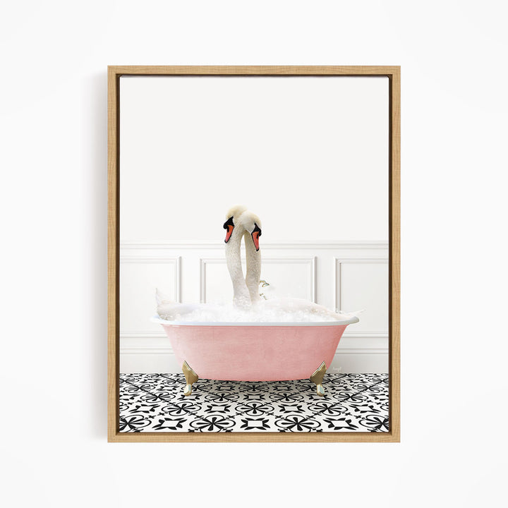 A pink bathtub filled with bubbles, with two white swans standing in it.