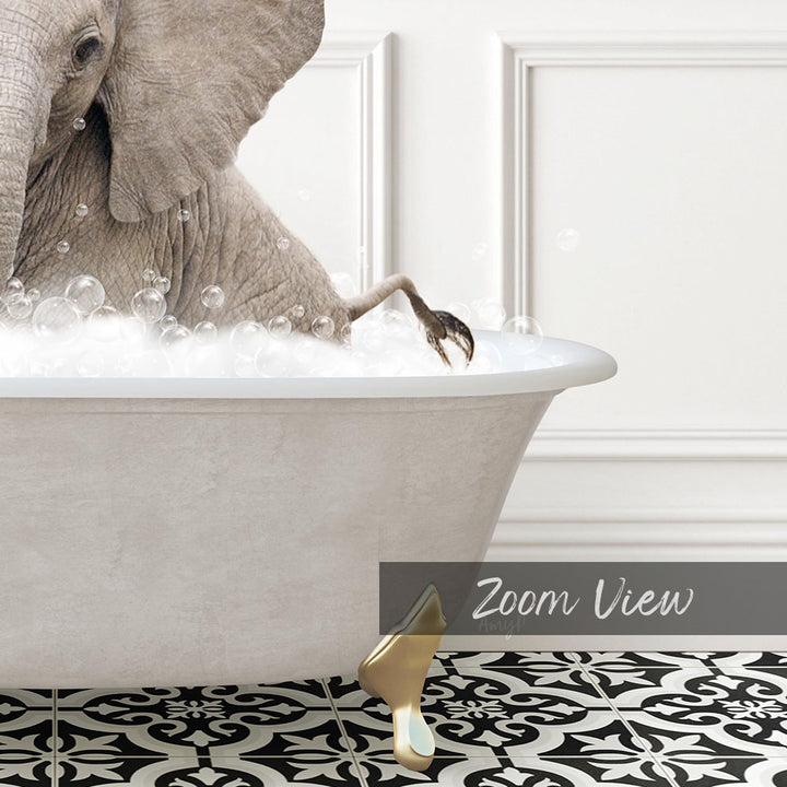 A large elephant is sitting in a bathtub filled with bubbles, with its trunk submerged in the water.