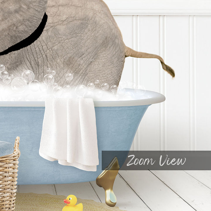 A bathtub filled with bubbles, with a towel and a rubber duck inside.