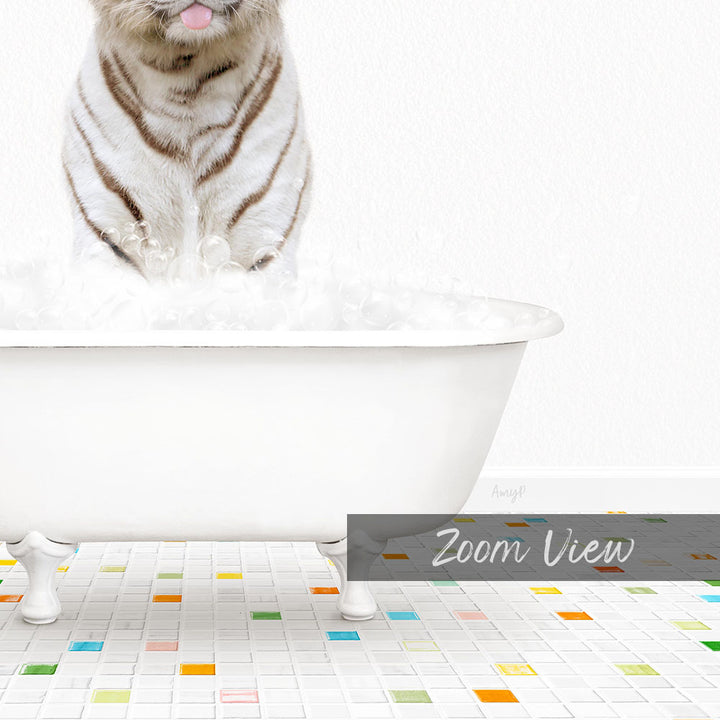 A white cat sitting in a white bathtub filled with bubbles, with a colorful tiled floor in the foreground.