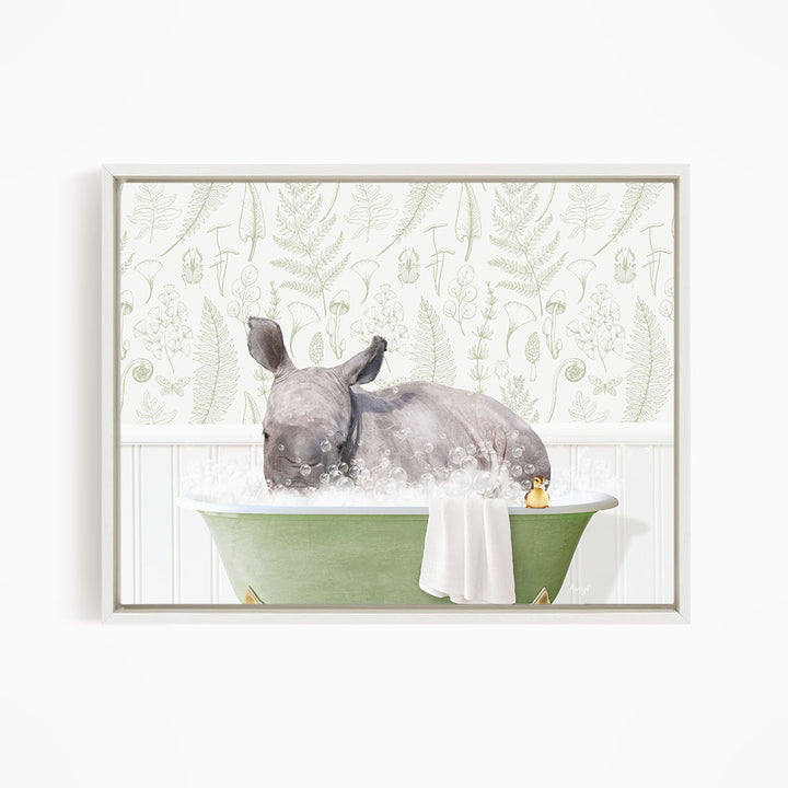 A rhinoceros is sitting in a green bathtub filled with water, surrounded by a patterned wallpaper.