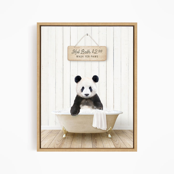 A panda bear sitting in a bathtub, with a sign above it that reads "Hot Bath $2.00 WASH YET Paws".