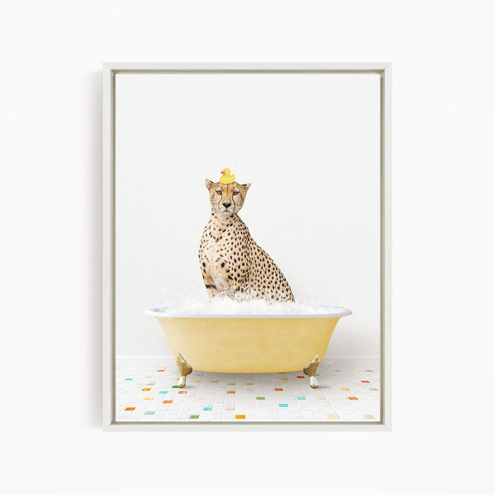 A cheetah sitting in a yellow bathtub filled with water, wearing a yellow rubber duck hat.