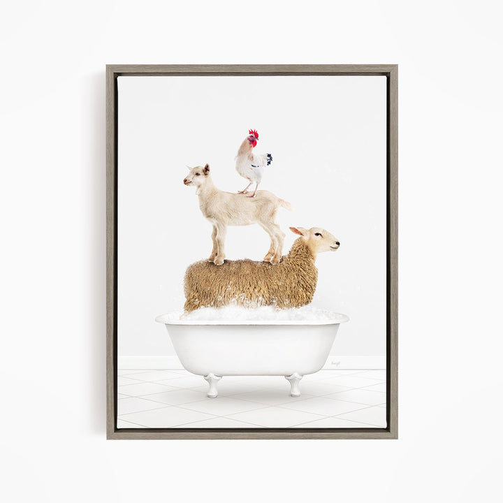 A framed image depicting a white bathtub filled with water, with a goat standing on top of a sheep and a rooster perched on a lamb.