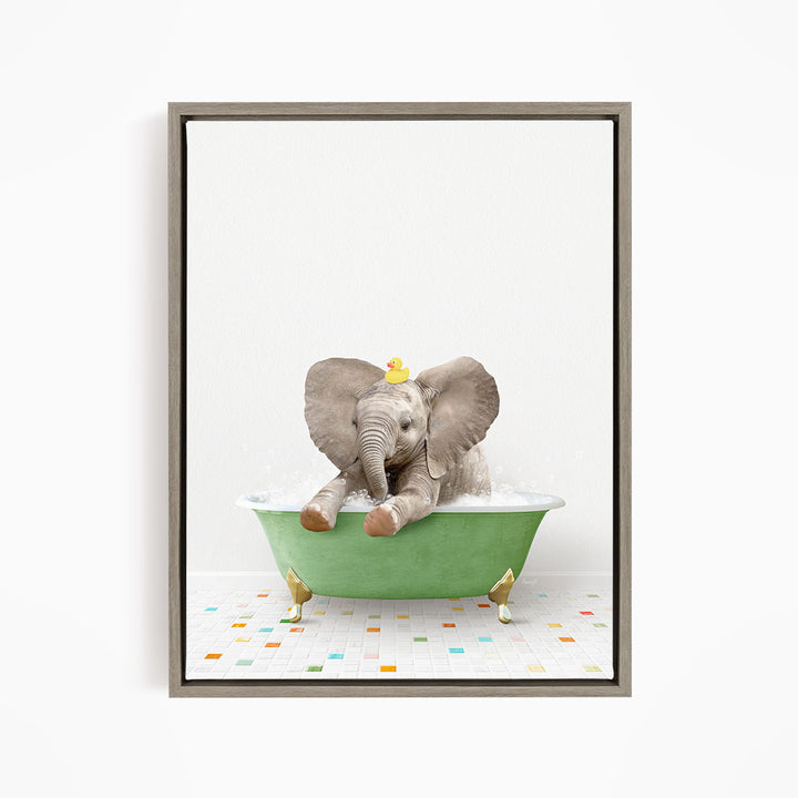 A baby elephant sitting in a green bathtub, with a yellow rubber duck on its head, and a colorful tiled floor in the background.