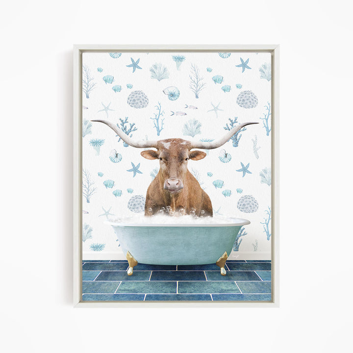 A brown steer with large horns is sitting in a blue bathtub filled with bubbles, surrounded by a pattern of seashells and starfish.