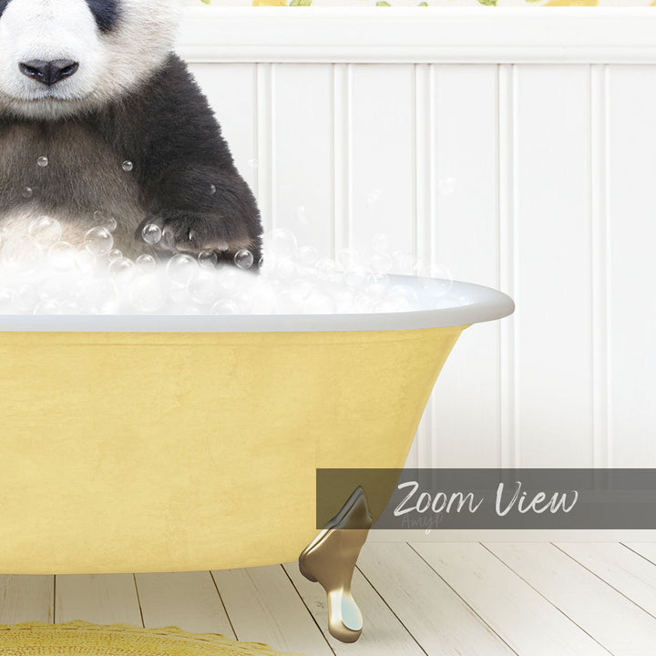 A panda bear sitting in a yellow bathtub filled with bubbles, with a white wall and wooden floor in the background.
