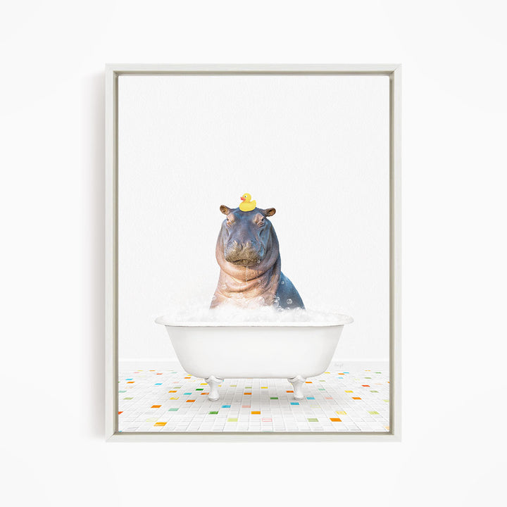 A hippopotamus sitting in a bathtub with a yellow rubber duck on its head.