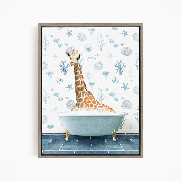 A giraffe is sitting in a bathtub filled with bubbles, surrounded by a blue and white ocean-themed wallpaper.