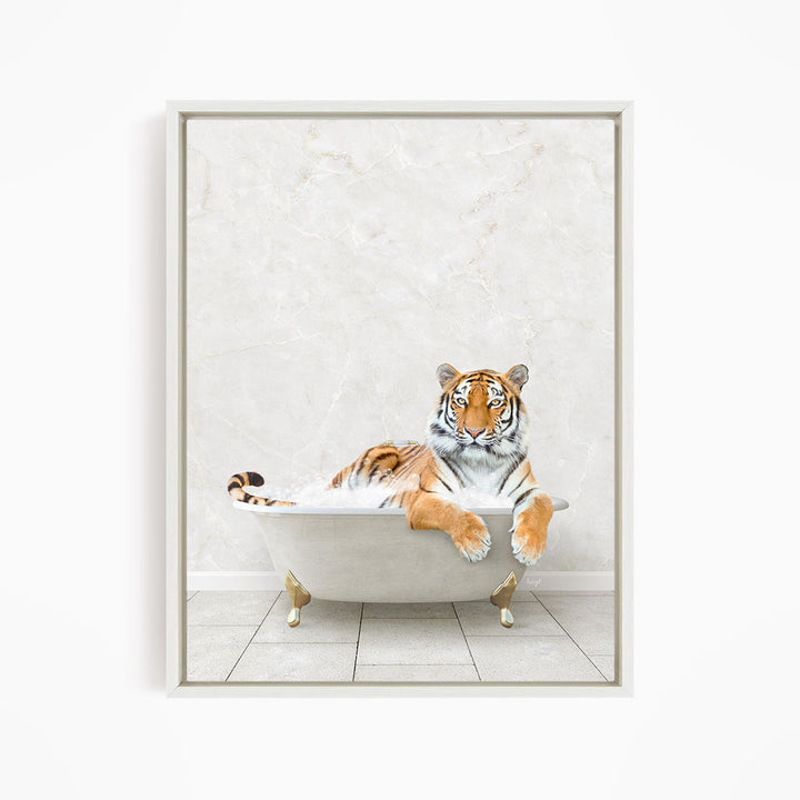 A tiger is sitting in a white bathtub, appearing relaxed and comfortable.