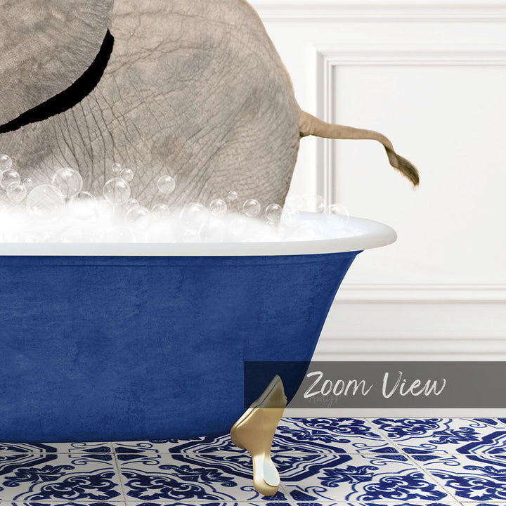 A large blue bathtub filled with bubbles, with a gold faucet and a gold shoe placed in the tub.