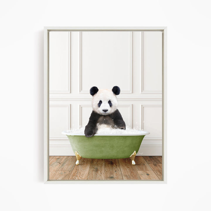 A panda bear sitting in a green bathtub filled with bubbles, looking directly at the camera.