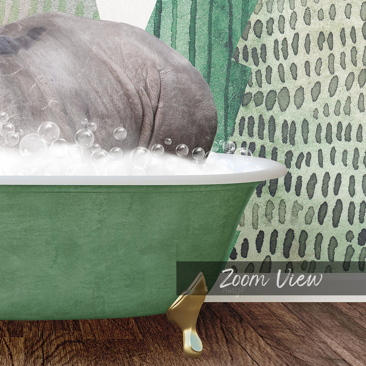 A large gray rhinoceros is sitting in a green bathtub filled with bubbles, with a patterned wall in the background.