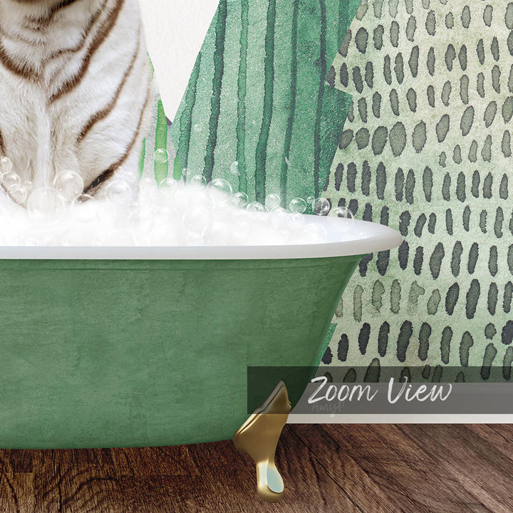A white tiger is sitting in a green bathtub filled with bubbles, with a patterned wall in the background.