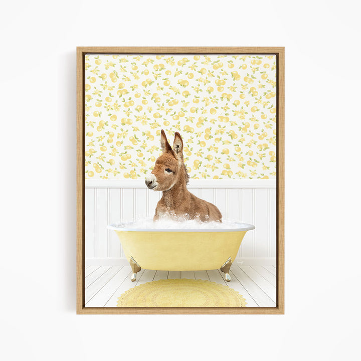 A donkey is sitting in a yellow bathtub filled with bubbles, surrounded by a yellow floral wallpaper.