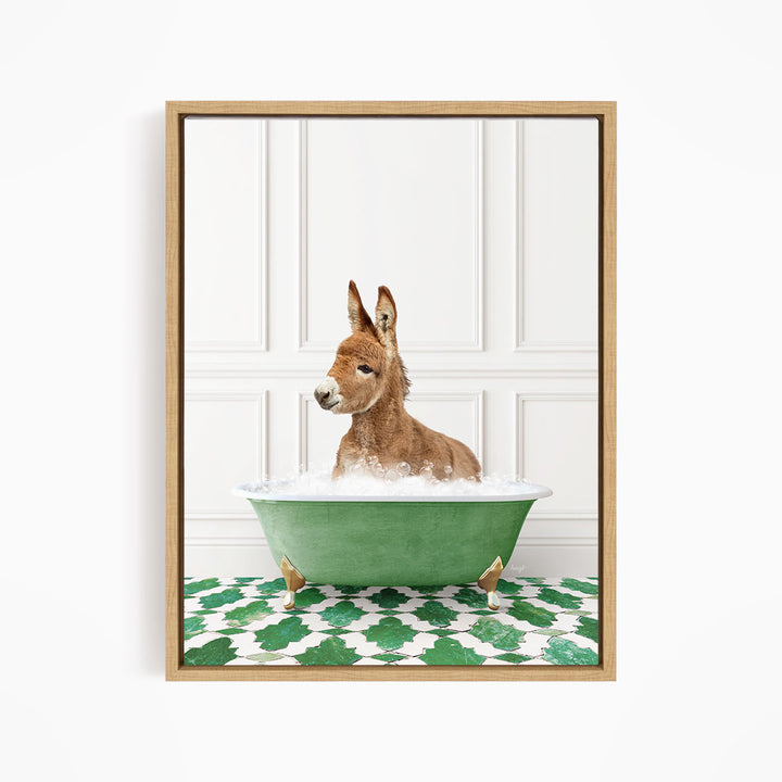 A donkey is sitting in a green bathtub filled with water, surrounded by a patterned green and white floor.