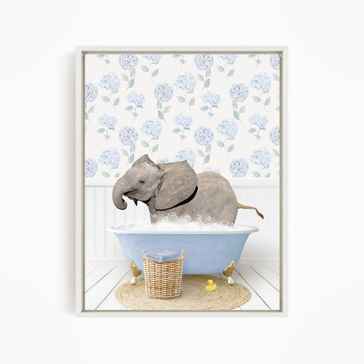 A gray elephant is taking a bath in a blue bathtub, surrounded by a wicker basket and yellow rubber ducks.