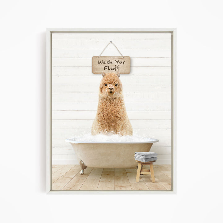 A fluffy brown dog sitting in a bathtub filled with water, with a sign above that says "Wash Yer Fluff".