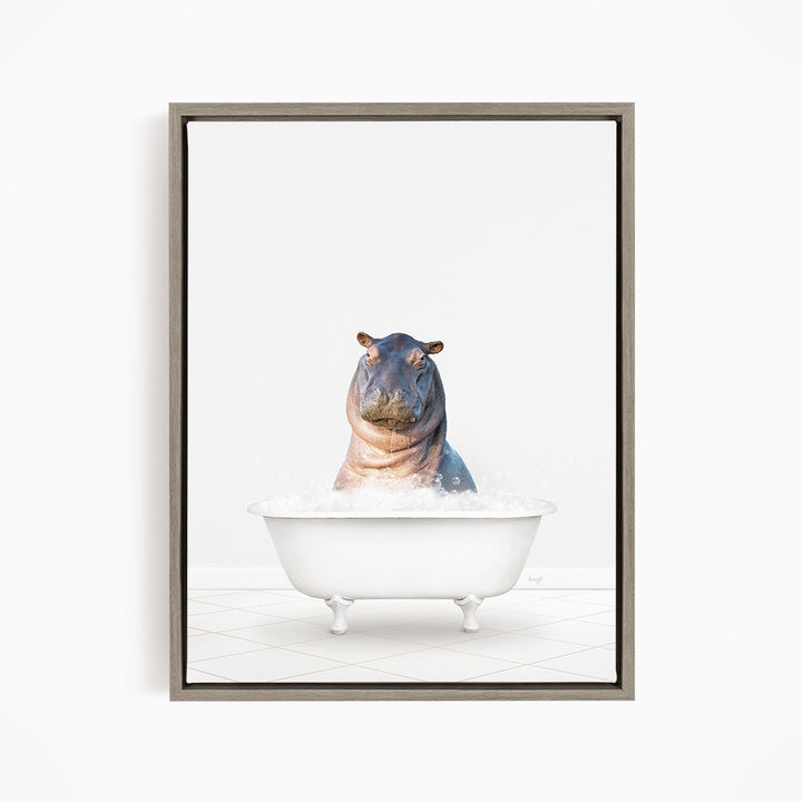 A hippopotamus sitting in a white bathtub filled with water, creating a whimsical and playful scene.