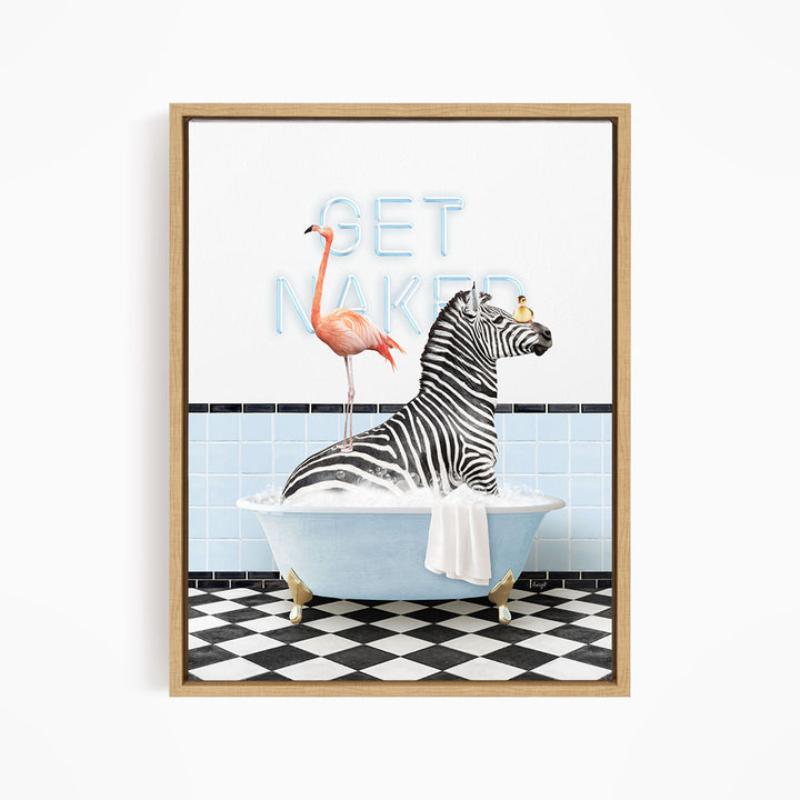 A framed image depicting a zebra sitting in a bathtub, with a flamingo standing on its back and the words "GET NAKED" written on the wall behind them.