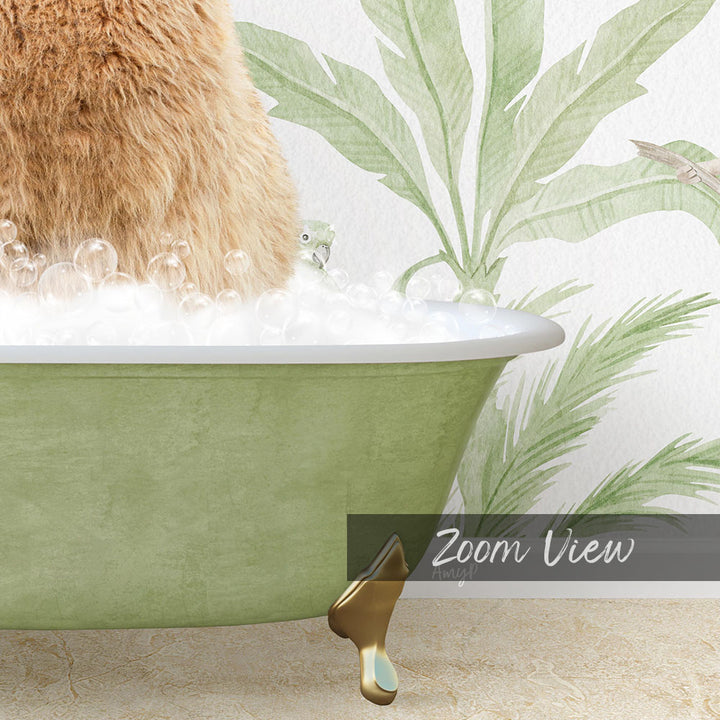 A cat is sitting in a green bathtub filled with bubbles, with a palm tree wallpaper in the background.