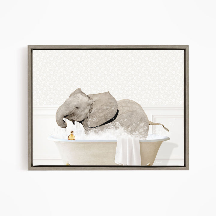 A gray elephant is sitting in a bathtub filled with water, surrounded by a towel and a small yellow object.